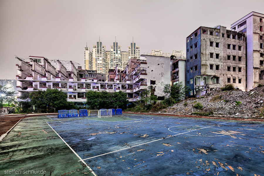 abandoned
 sports ground
 Guangzhou
 China
 demolition
 football
 night
