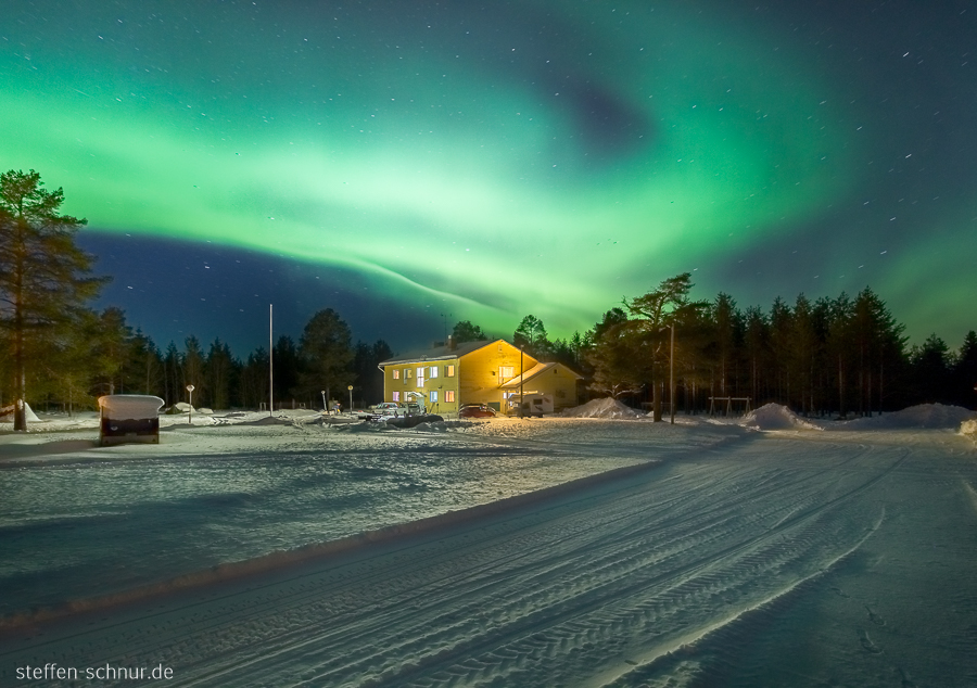 northern lights
 snow
 Polar Circle
 Lapland
 Finland
 village
 house
