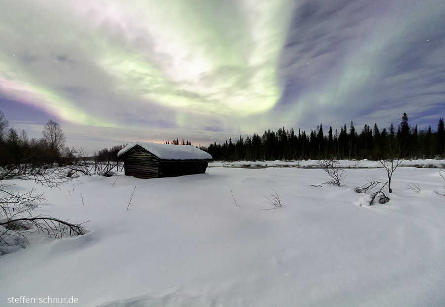 aurora borealis
 snow
 Polar Circle
 Lapland
 Finland
 cottage
 landscape
