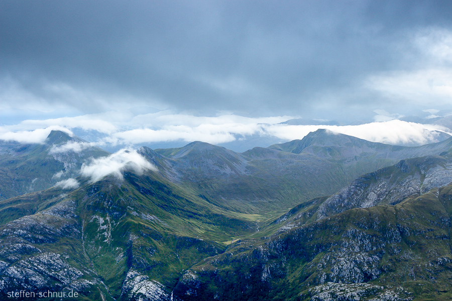 Berge Hochland Schottland Wolken dunkel
