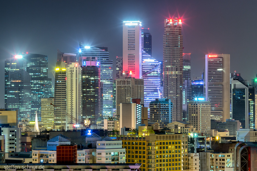 city skyline
 sea of houses
 skyscraper
