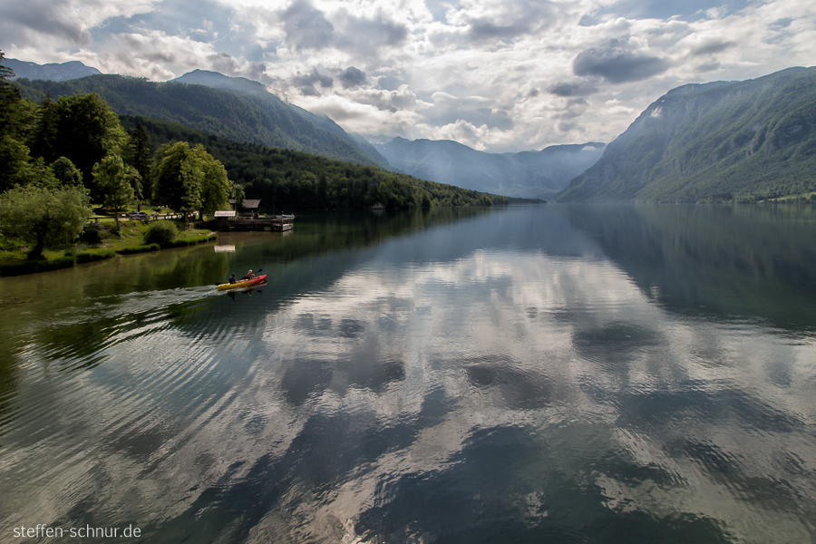 Berge Wocheiner See Slowenien Kanu Reflexionen See Wolken